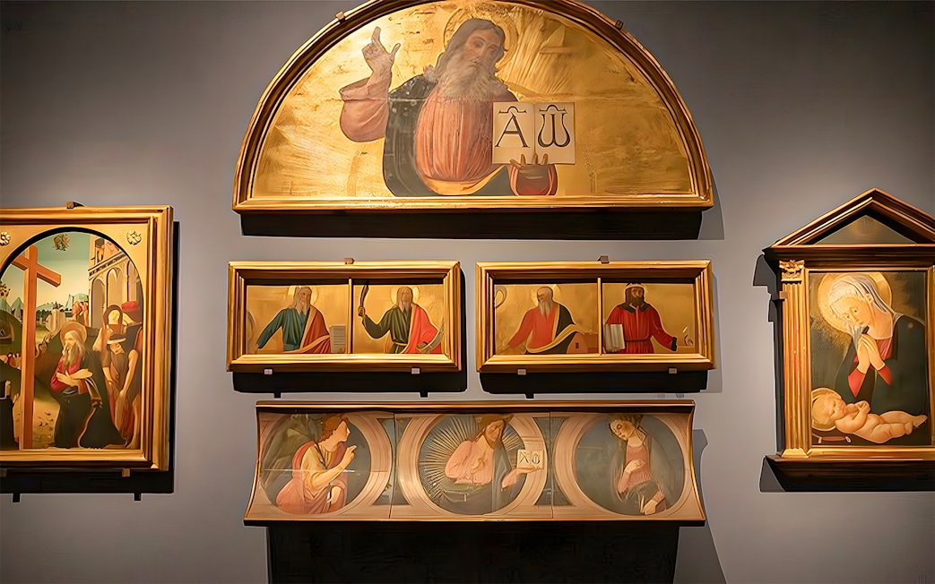 Paintings displayed at Accademia Gallery, Florence, featuring religious figures and scenes.