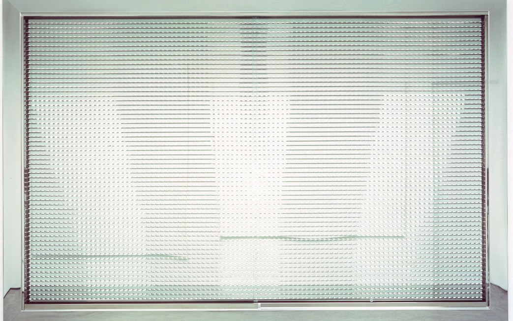 Entrance to Moco Museum London with modern art installation.