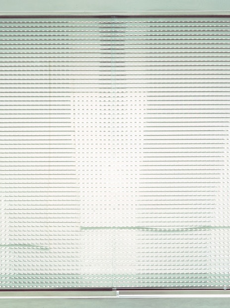 Entrance to Moco Museum London with modern art installation.