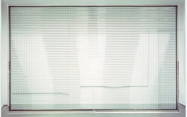 Entrance to Moco Museum London with modern art installation.