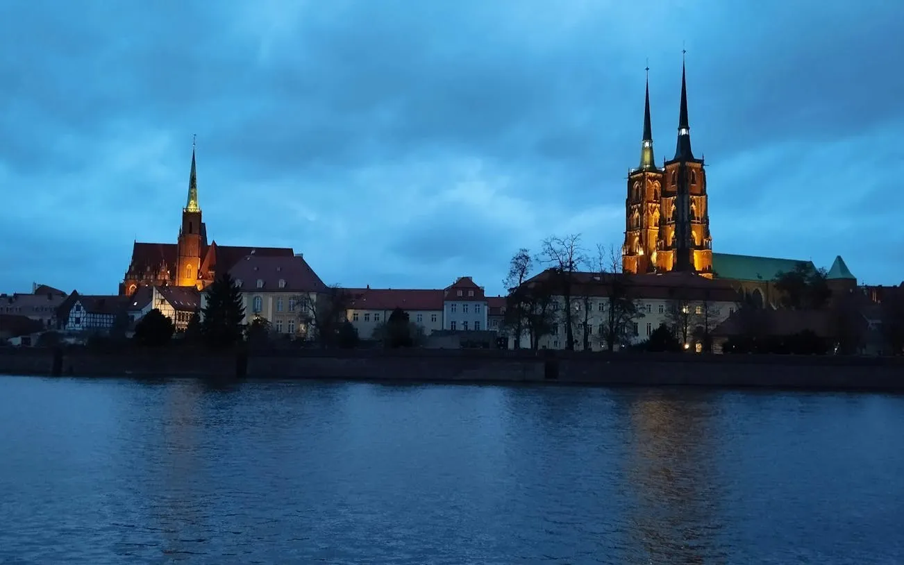 Wroclaw Cathedral and skyline at dusk during self-guided city exploration game.