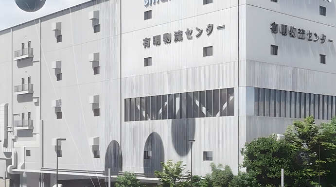 Small Worlds Tokyo building exterior with grand opening balloons.