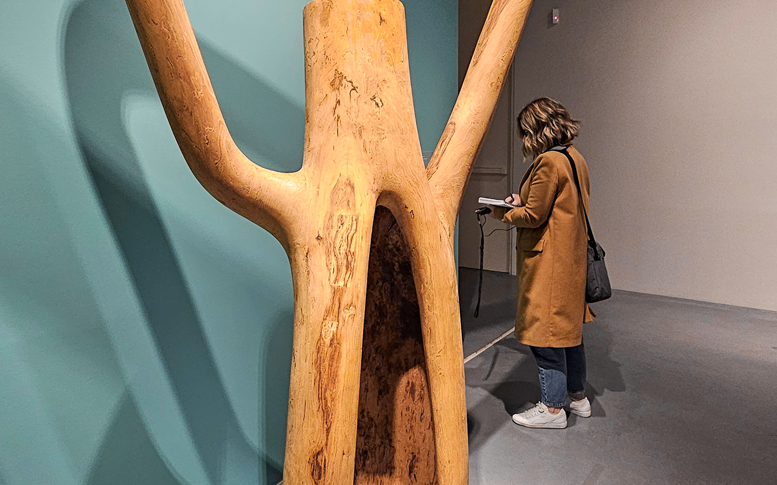 Visitor observing sculpture at Picasso's Birthplace Museum.