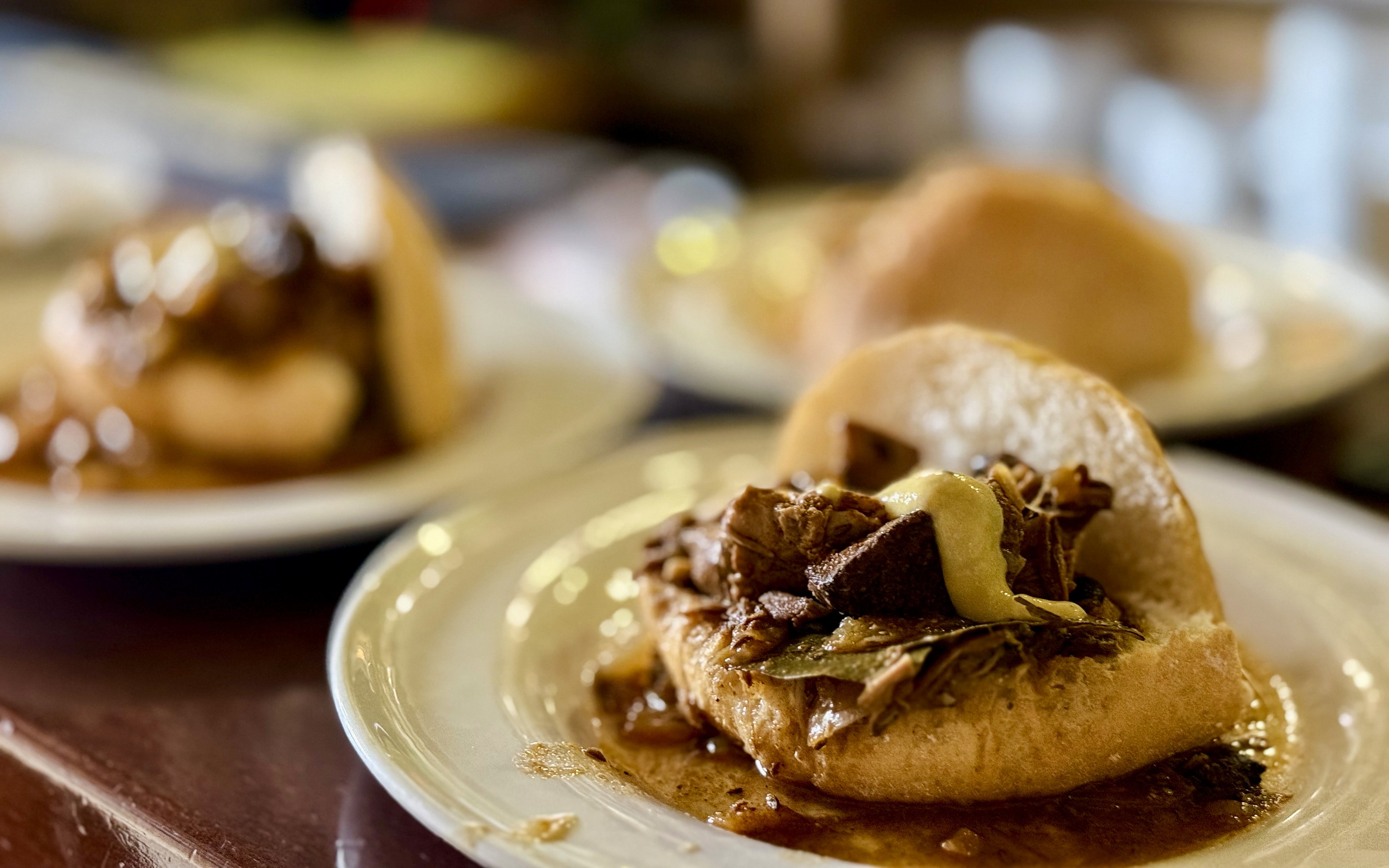 Traditional Polish beef stew served in bread, Krakow, Poland.