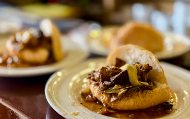 Traditional Polish beef stew served in bread, Krakow, Poland.