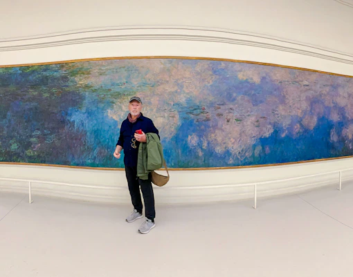 Orangerie Museum interior with Monet's Water Lilies exhibit in Paris, France.