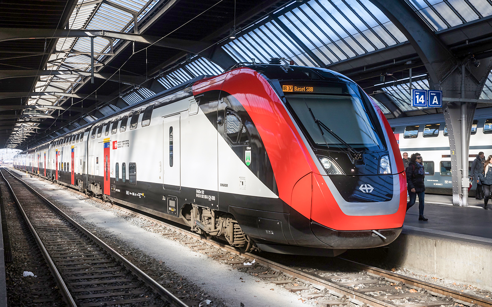 Train at Zurich station platform for one-way trip to Zurich Central.