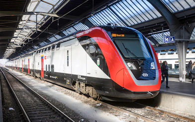Train at Zurich station platform for one-way trip to Zurich Central.