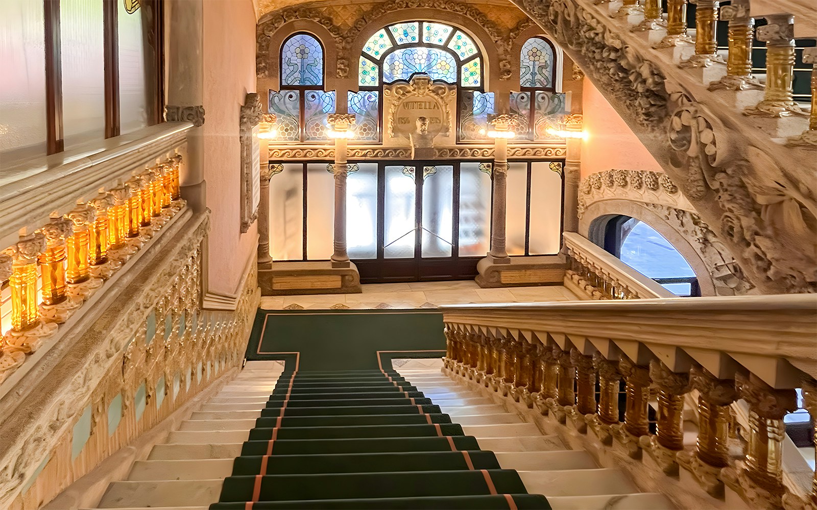 Staircase inside Palau de la Musica Catalana, showcasing intricate architectural details in Barcelona.