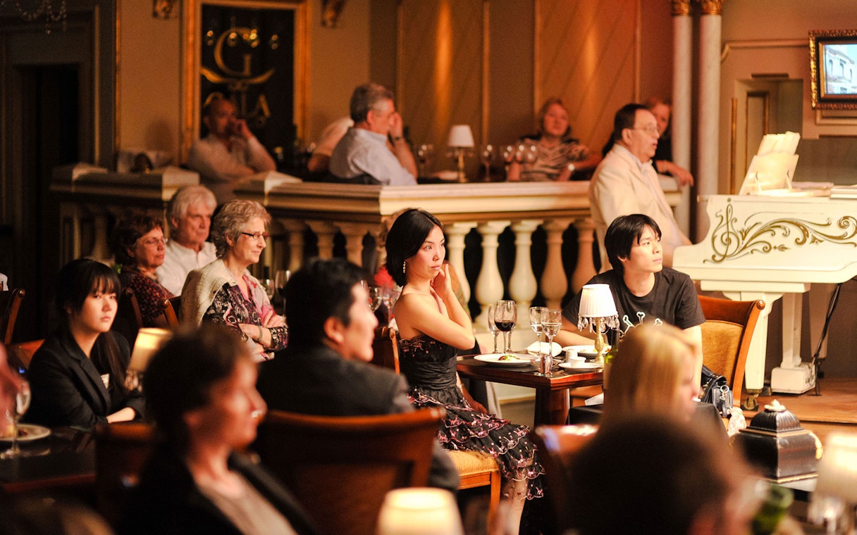 Audience enjoying a live performance at Gala Tango Show in Buenos Aires.