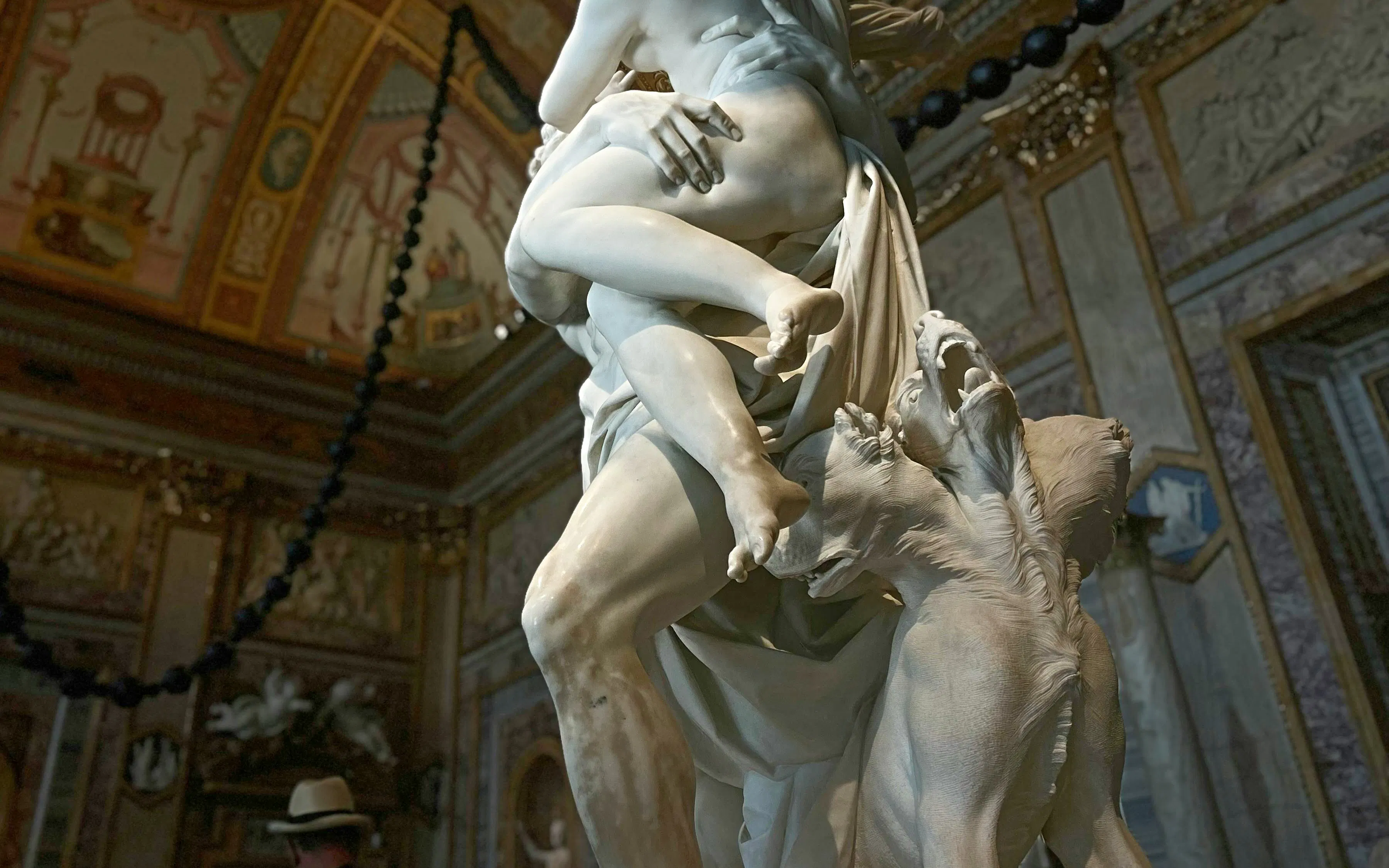 Bernini's "The Rape of Proserpina" sculpture in Rome museum.