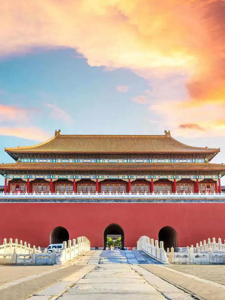 Meridian Gate entrance to the Forbidden City, Beijing, under a vibrant sky.