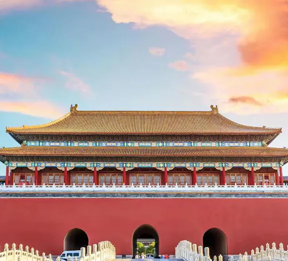 Meridian Gate entrance to the Forbidden City, Beijing, under a vibrant sky.