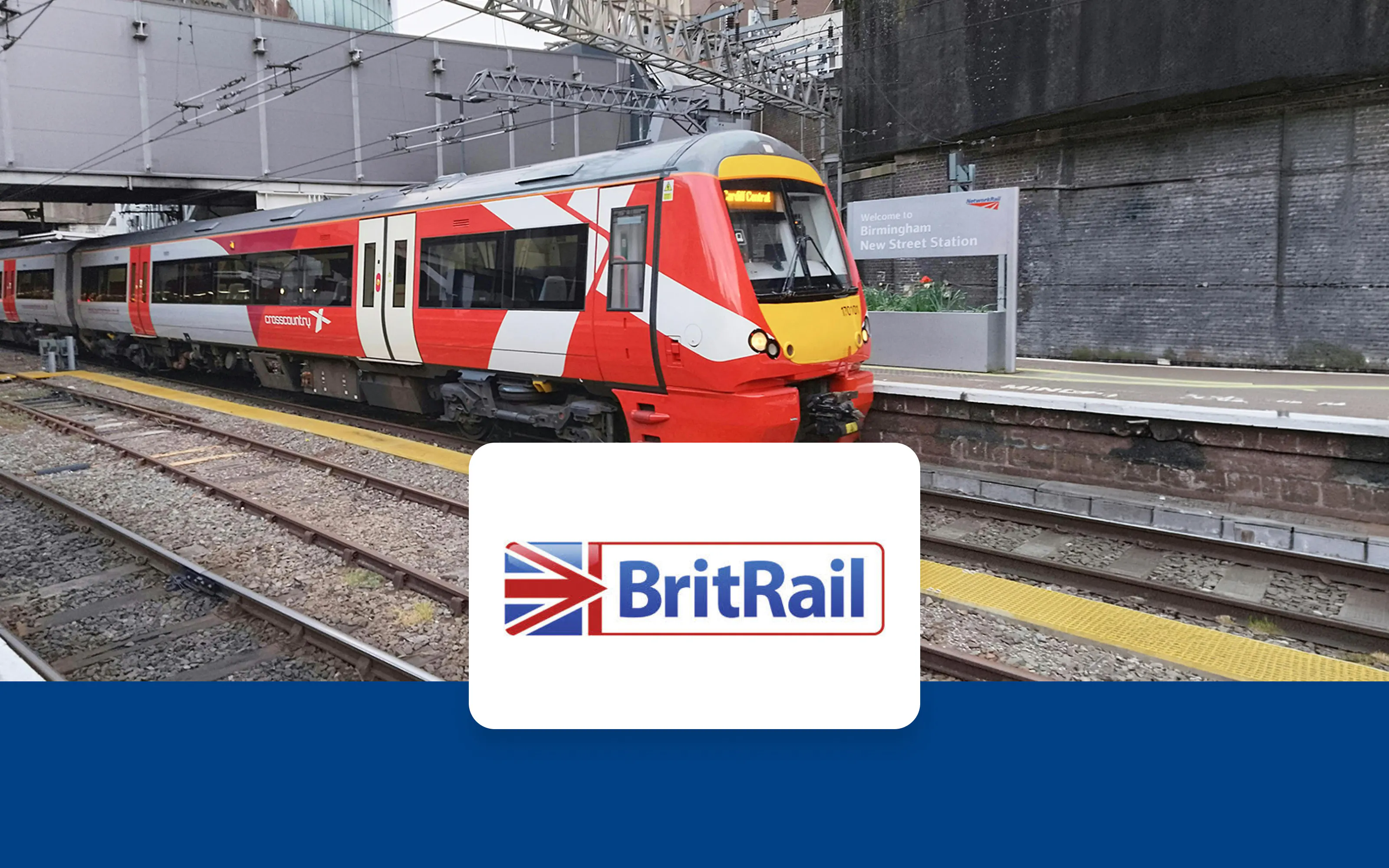 Train at Birmingham New Street Station with BritRail logo.