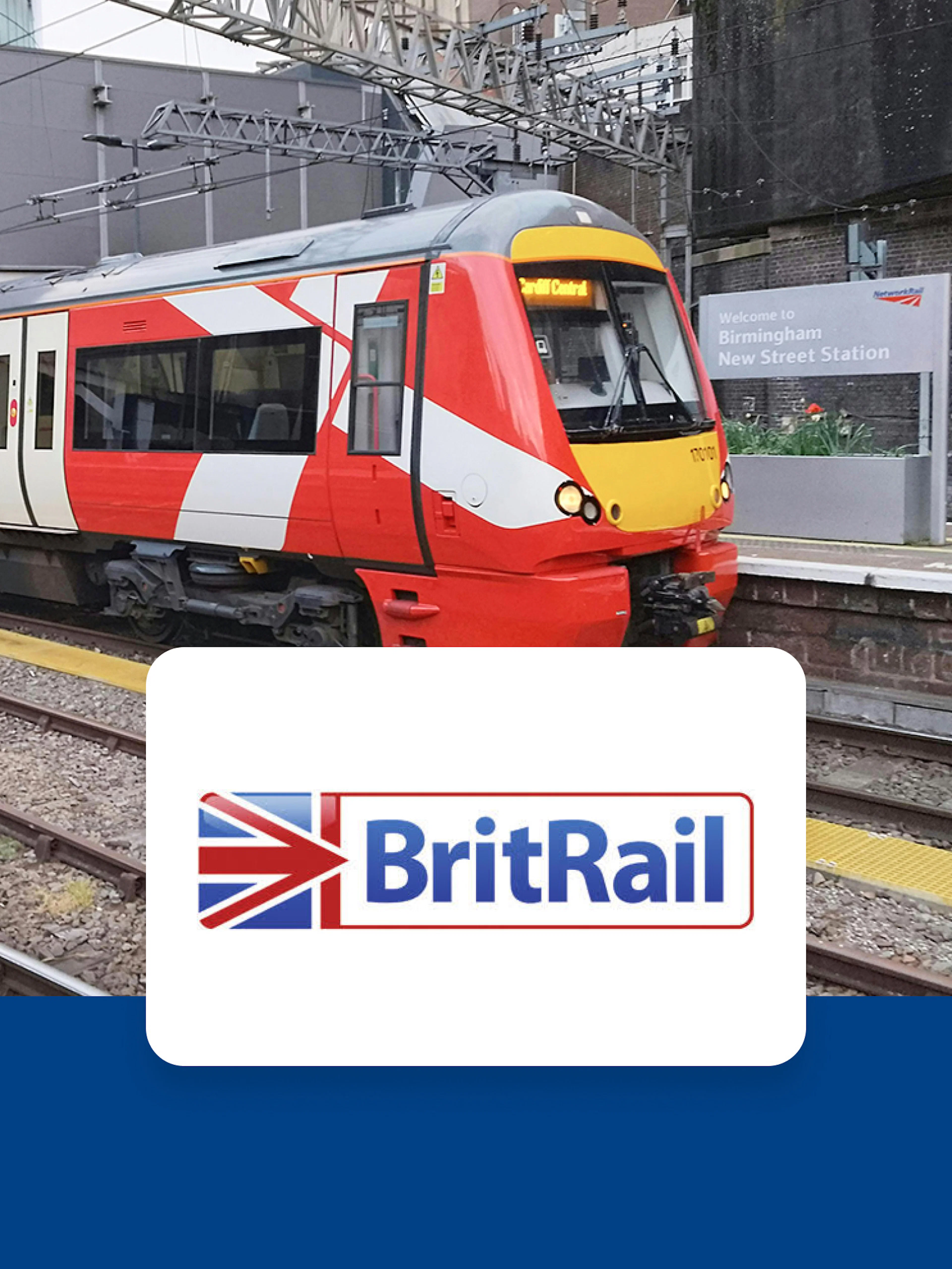 Train at Birmingham New Street Station with BritRail logo.
