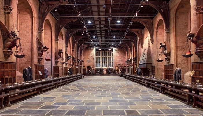 Great Hall set at Warner Bros. The Making of Harry Potter Studio Tour with long tables and floating candles.