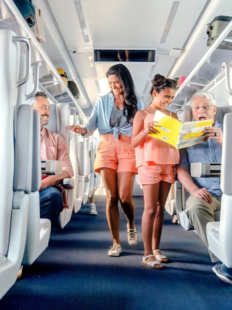 Passengers enjoying a ride on the Brightline train from Miami to Orlando.