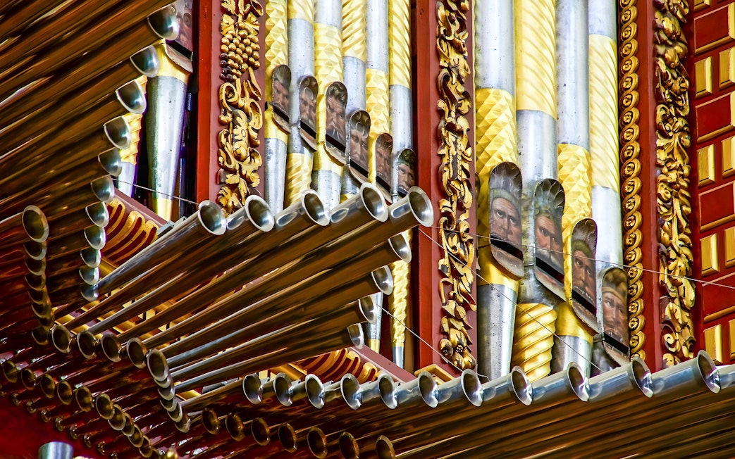 Ornate organ pipes inside Cordoba Mosque-Cathedral, Spain.