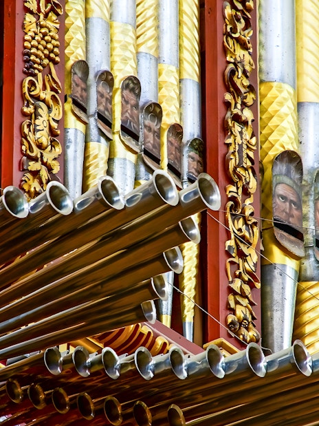 Ornate organ pipes inside Cordoba Mosque-Cathedral, Spain.