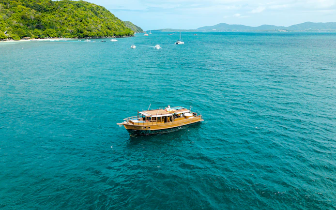 Phuket Private Longtail Boat Charter with Jacuzzi to Coral Island Banana Beach and Promthep Cape