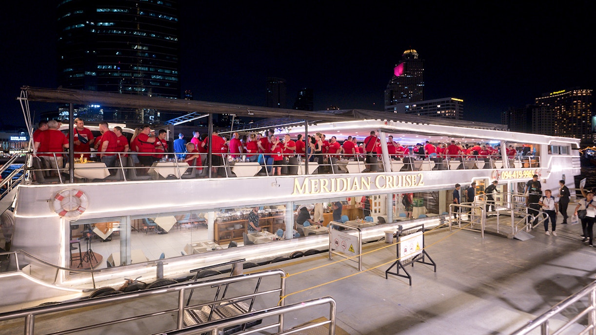 People enjoying a night on the Meridian Cruise in Bangkok.