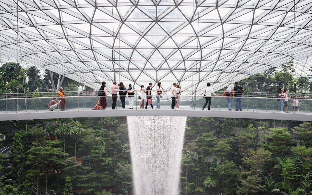 https://cdn-imgix.headout.com/media/images/4558d4029f25bf2b1dd0f20a3b573919-Jewel%20Changi%20Airport%20-%20Canopy%20Bridge.jpeg
