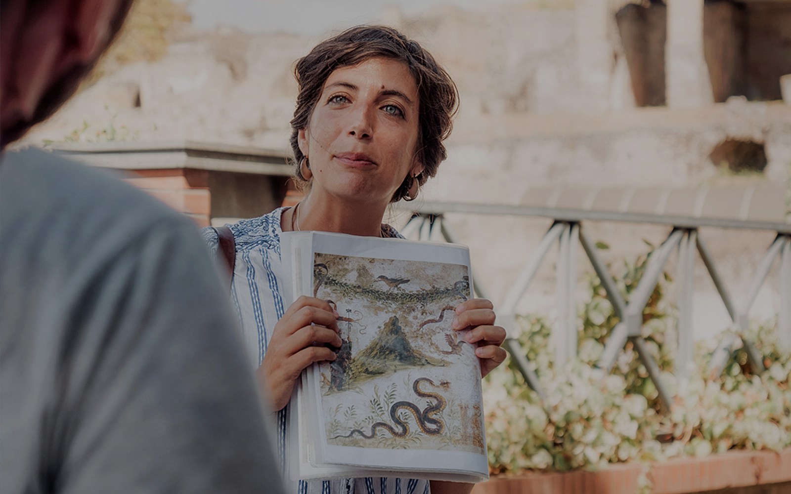 Guide giving tour of the ancient city, Pompeii