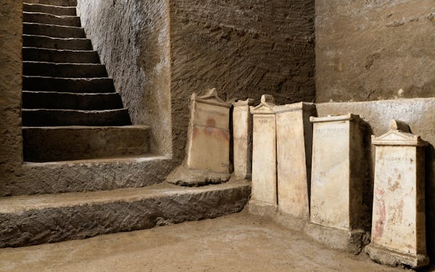 Ancient stone tombs and staircase in Ipogeo dei Cristallini, Naples.