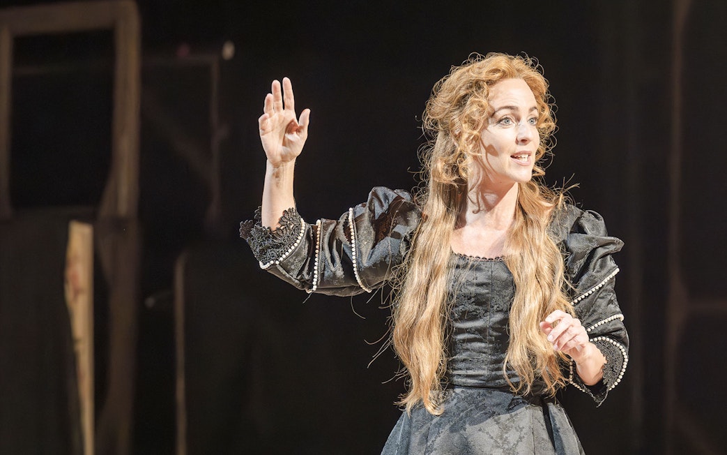 Performer on stage in Grace Pervades West End show.