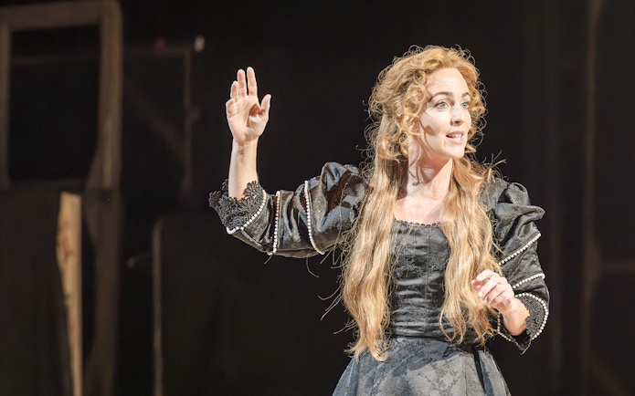 Performer on stage in Grace Pervades West End show.