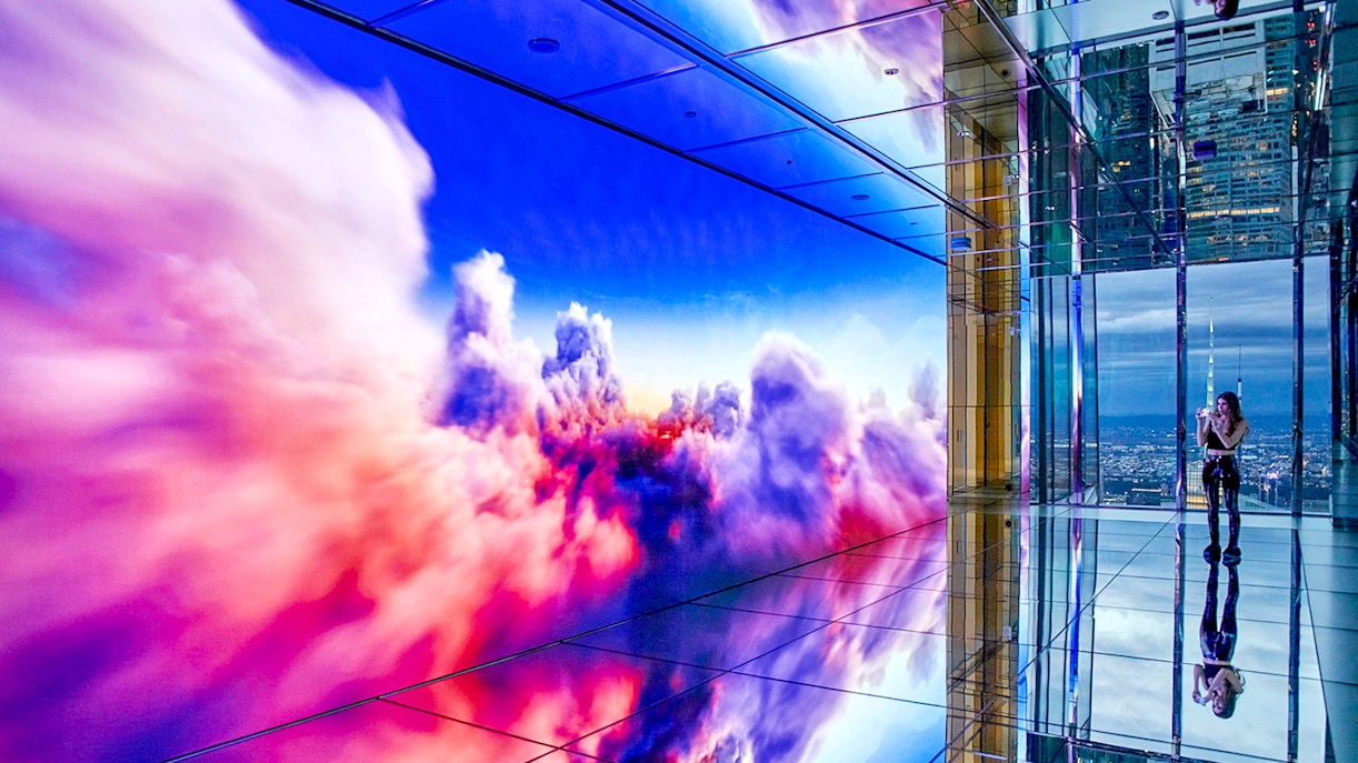 Colorful digital clouds display at SUMMIT One Vanderbilt observation deck.