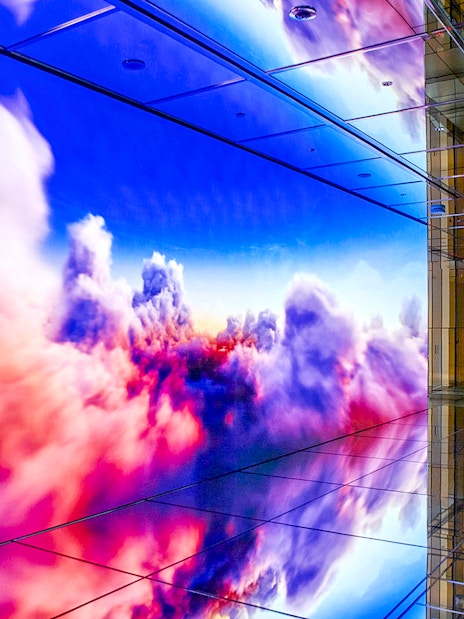 Colorful digital clouds display at SUMMIT One Vanderbilt observation deck.