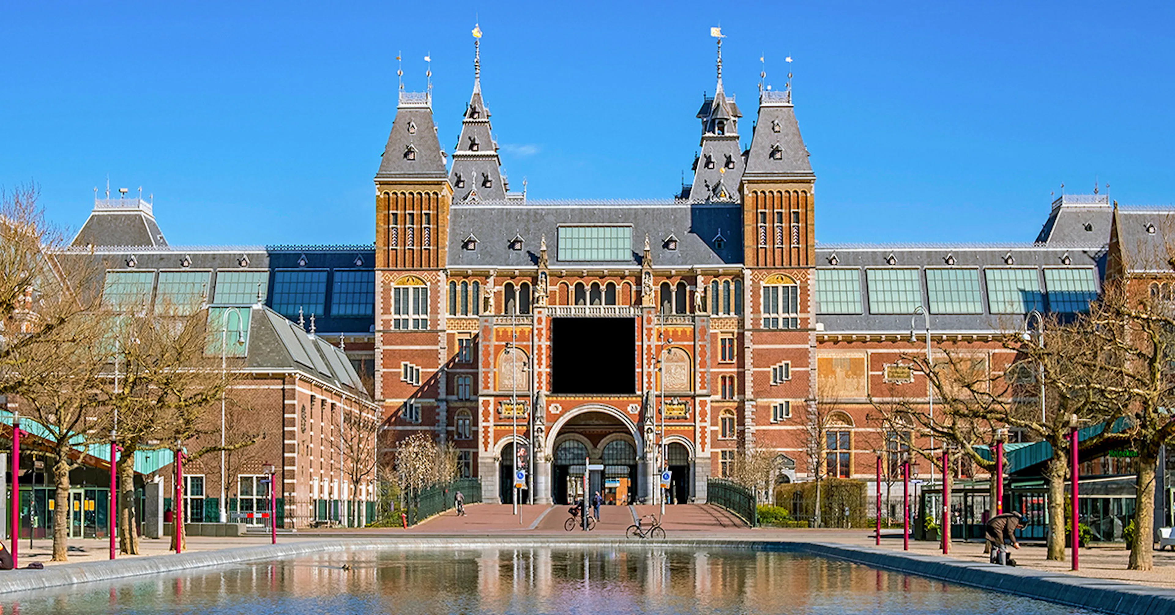 Rijksmuseum facade with reflection in Amsterdam, Netherlands.