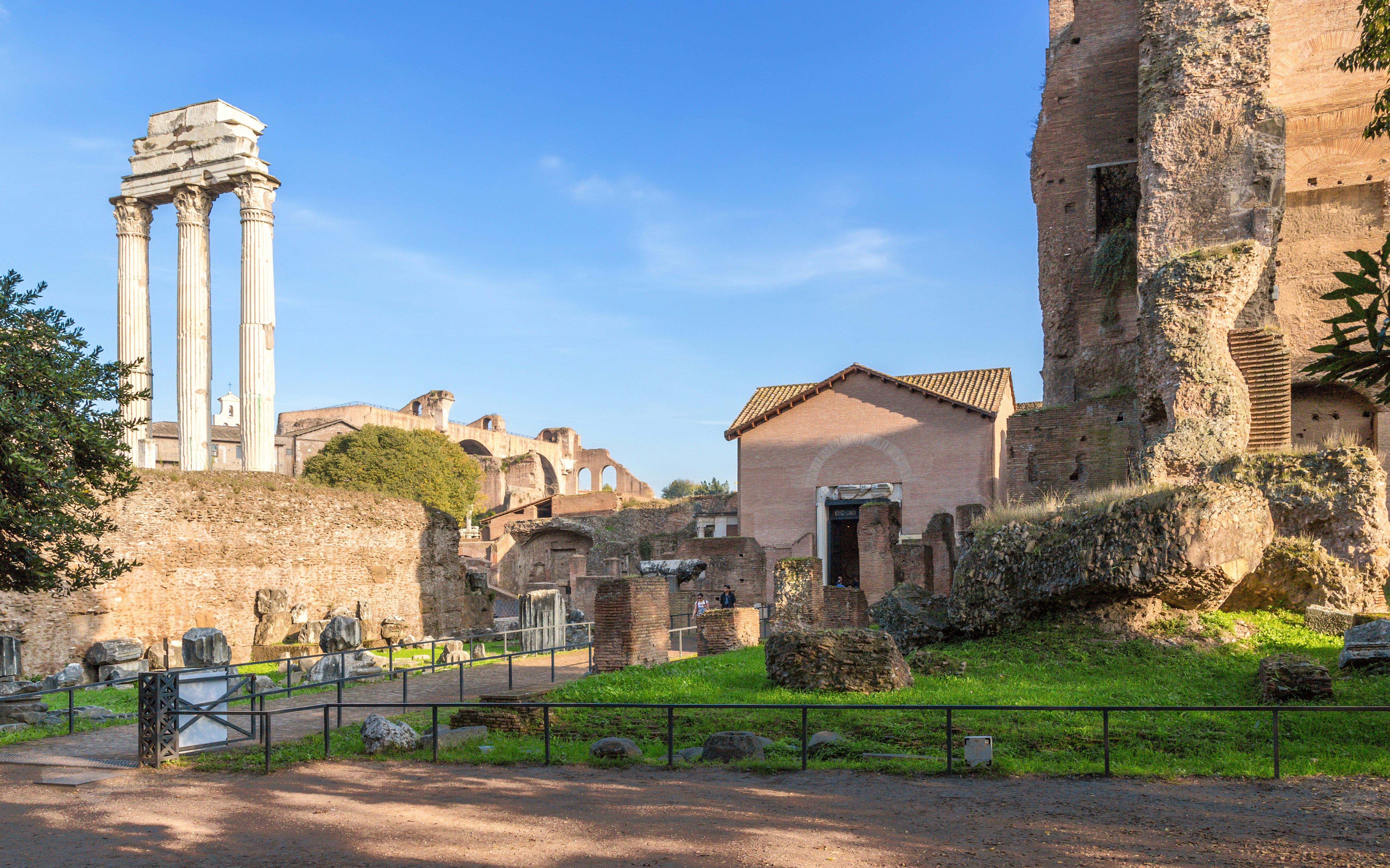 Church of Santa Maria Antiqua ruins in Roman Forum, Rome, with ancient columns and brick structures.