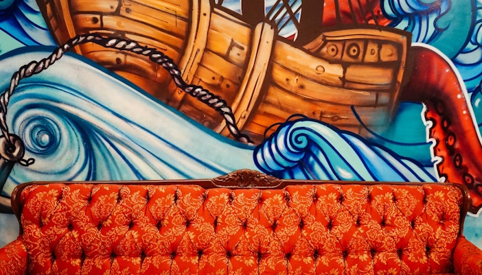 Diego Rivera mural depicting vibrant historical scenes in Mexico City.