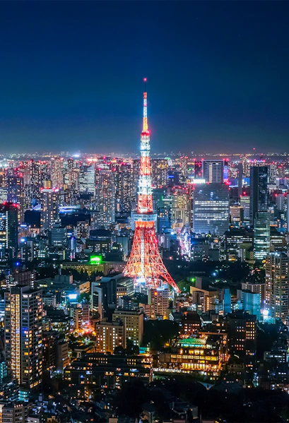 Tokyo Tower illuminated at night, viewed from Roppongi Hills Observation Deck.