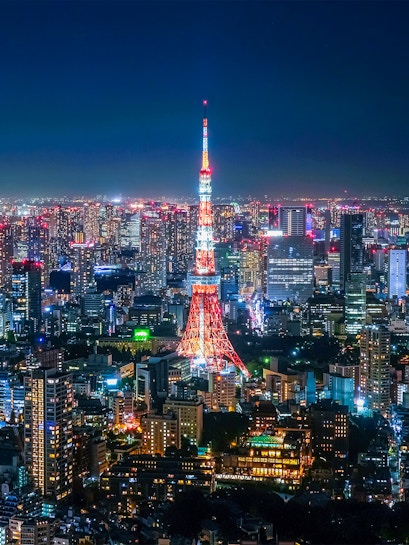 Tokyo Tower illuminated at night, viewed from Roppongi Hills Observation Deck.