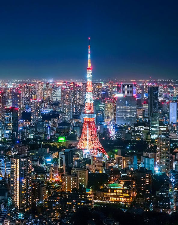 Tokyo Tower illuminated at night, viewed from Roppongi Hills Observation Deck.