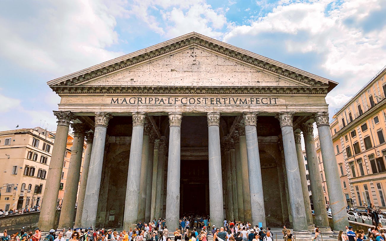 Pantheon facade with columns and crowd, Rome.