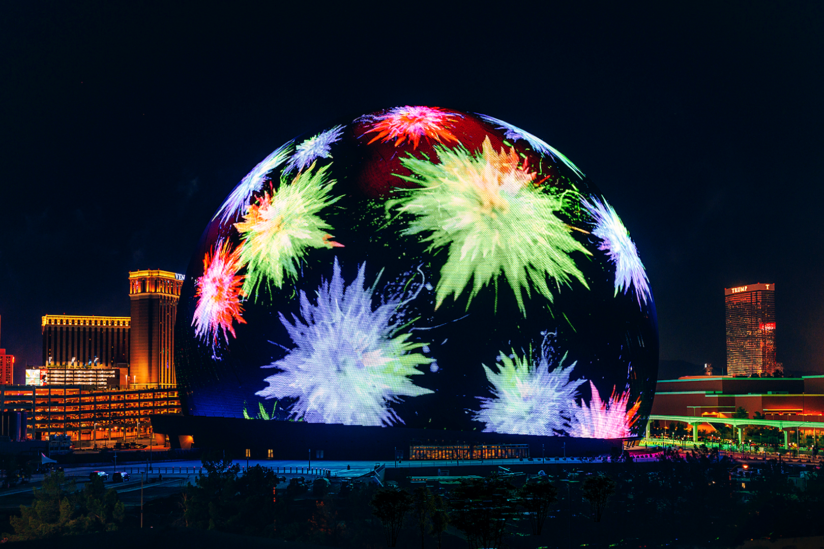 Exterior of illuminated Sphere in Las Vegas with colorful light display.