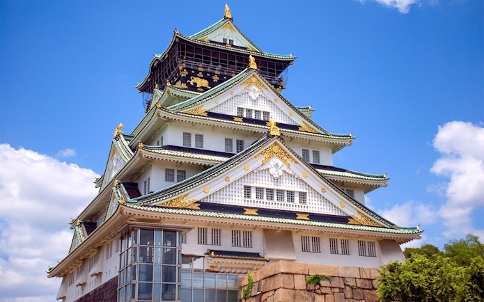 Exterior view of Osaka Castle with blue sky, Osaka, Japan.