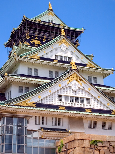Exterior view of Osaka Castle with blue sky, Osaka, Japan.
