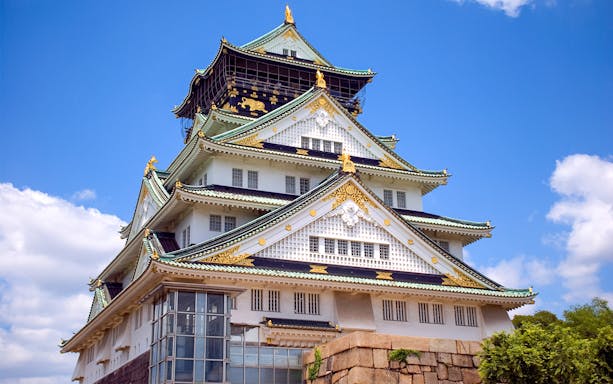 Exterior view of Osaka Castle with blue sky, Osaka, Japan.
