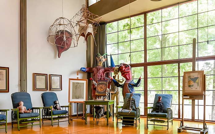 Interior of Diego Rivera's studio with sculptures and artwork, Museo Casa Estudio Diego Rivera y Frida Kahlo, Mexico City.