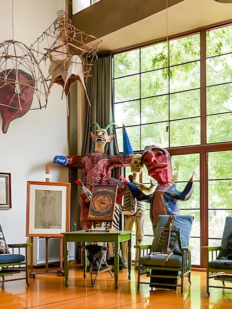 Interior of Diego Rivera's studio with sculptures and artwork, Museo Casa Estudio Diego Rivera y Frida Kahlo, Mexico City.