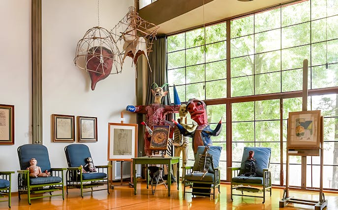 Interior of Diego Rivera's studio with sculptures and artwork, Museo Casa Estudio Diego Rivera y Frida Kahlo, Mexico City.