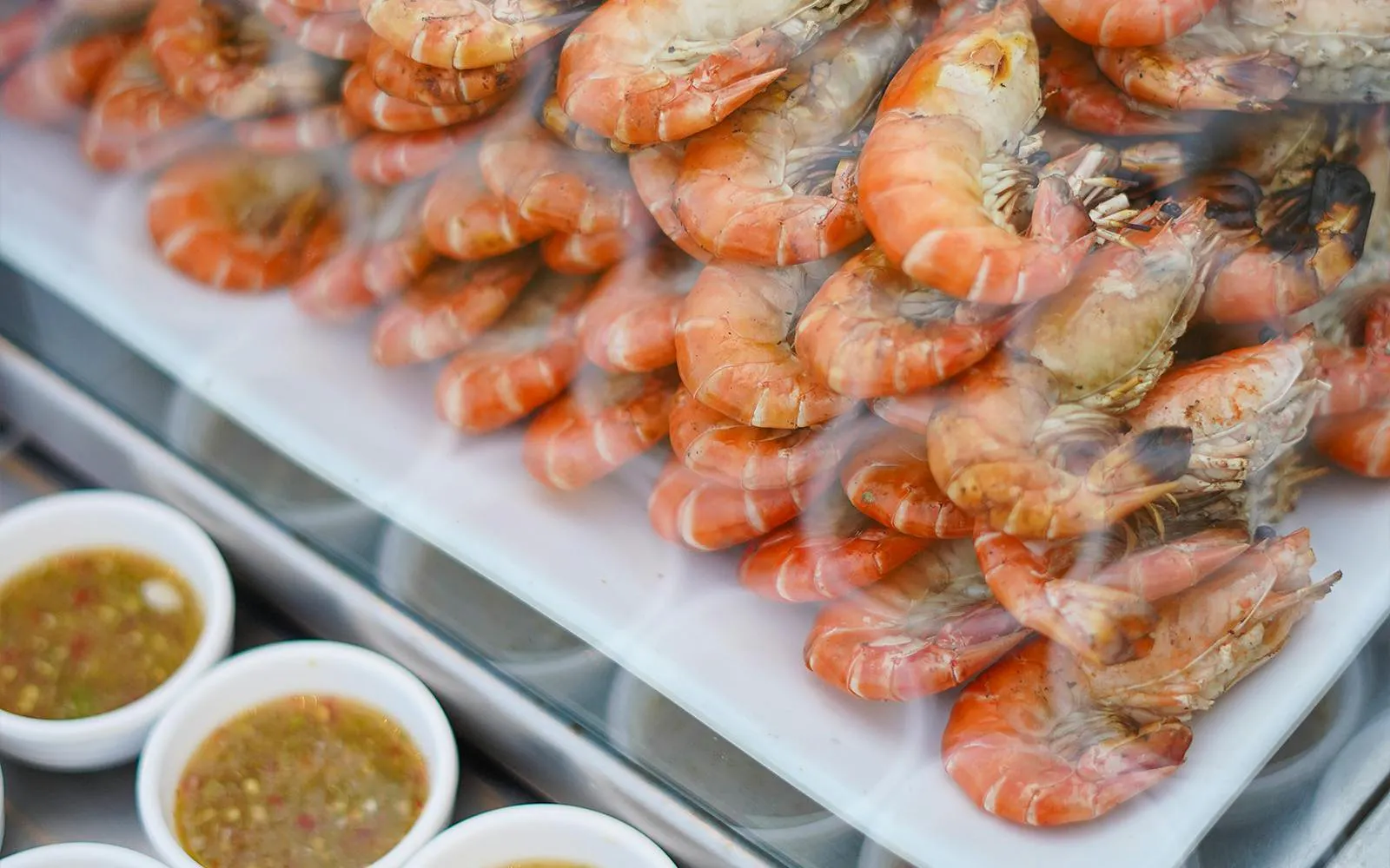 Prawns served with dipping sauce on a Riverside Carnival Cruise in Bangkok.