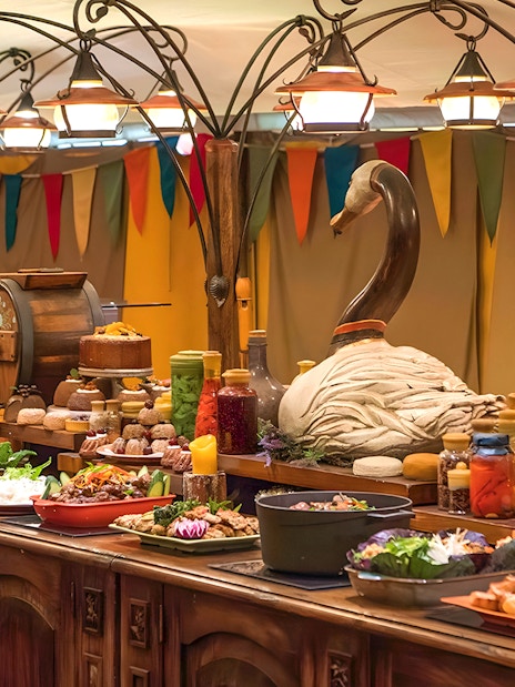 Festive buffet spread at Hobbiton Movie Set for a themed lunch on Auckland tour.