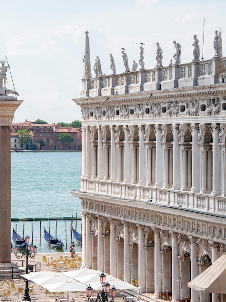 Venice Doge's Palace and San Marco column near the Grand Canal.