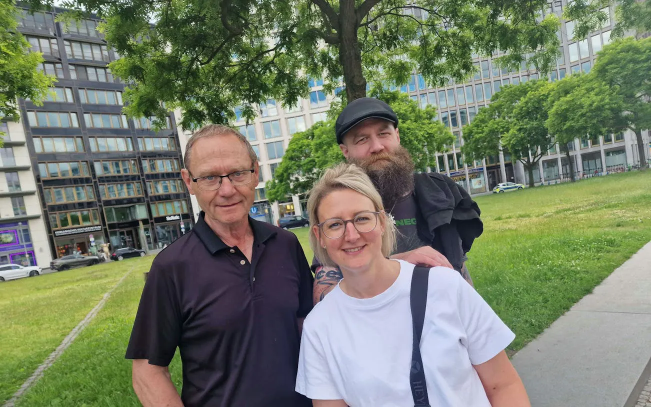 Group enjoying The Lost Gold of Berlin city exploration game in a park setting.
